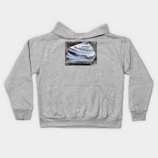 Close-up of beautiful layered triangular stone rock in white and grey stripes Kids Hoodie